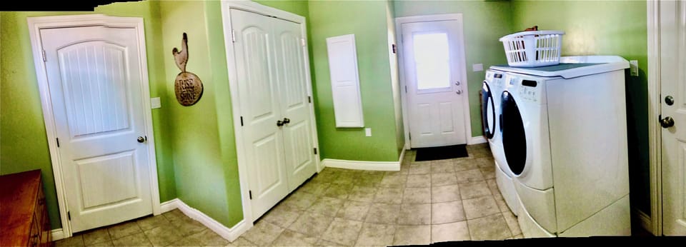 The door leaving the Laundry Room leads to the Back Porch.