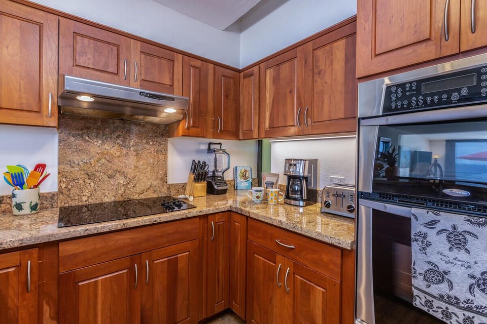 Fully stocked kitchen: Ninja blender, Cuisinart coffee maker, 4-slice toaster