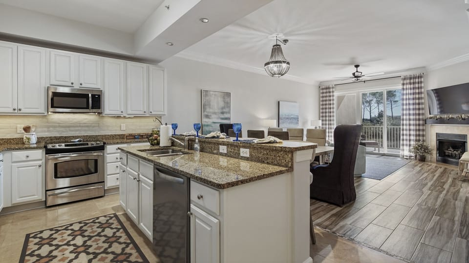Full kitchen, bar and table seating
