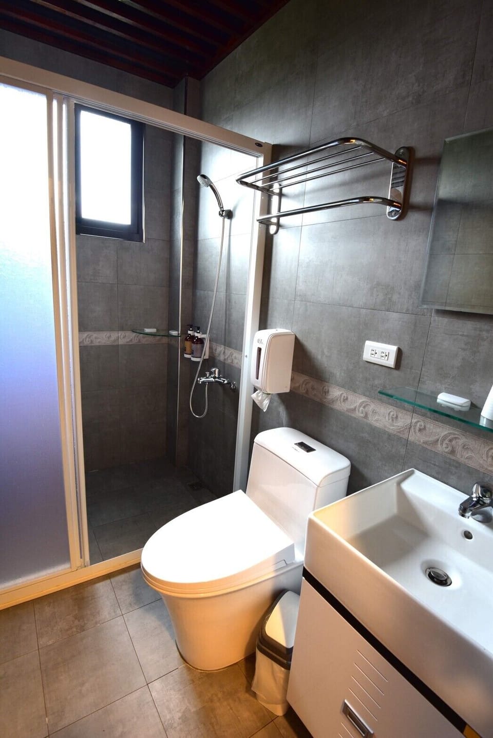 Shower, free toiletries, hair dryer, slippers