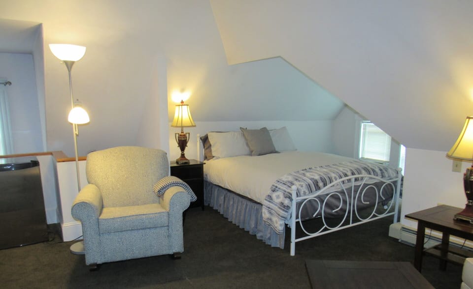 The Queen Size Bed Area in the Master Suite: the Entire Top Floor