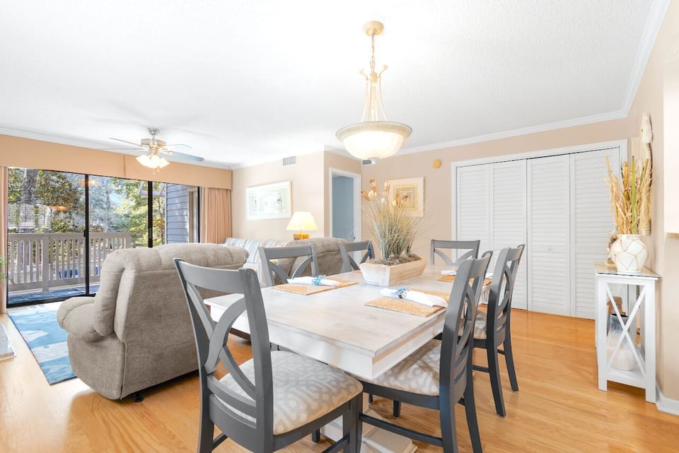 Beautiful outside view seen from dining area. Crown moulding throughout condo.