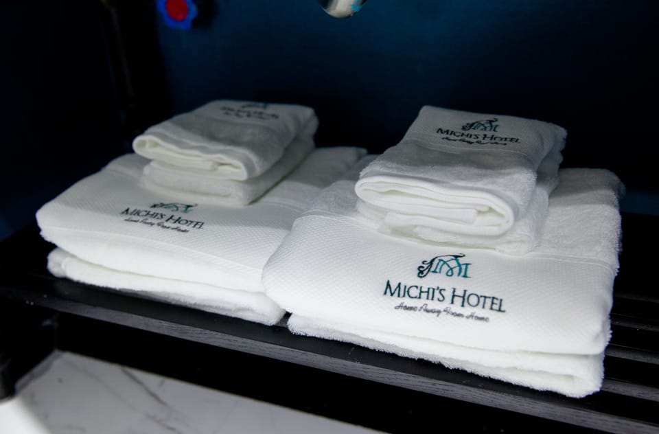Deluxe Room | Bathroom amenities | Designer toiletries, hair dryer, bathrobes, slippers