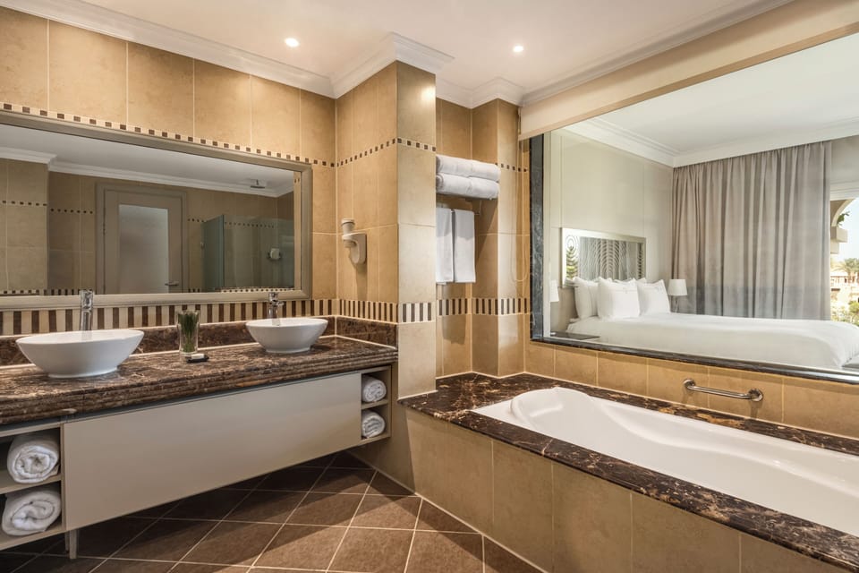 Combined shower/tub, free toiletries, hair dryer, bathrobes
