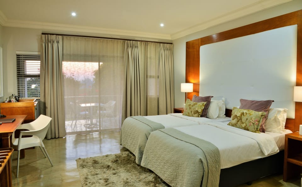 Deluxe Room | 2 bedrooms, minibar, in-room safe, iron/ironing board (on request)