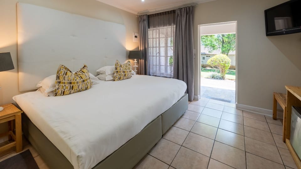 Deluxe Room | 2 bedrooms, minibar, in-room safe, iron/ironing board (on request)