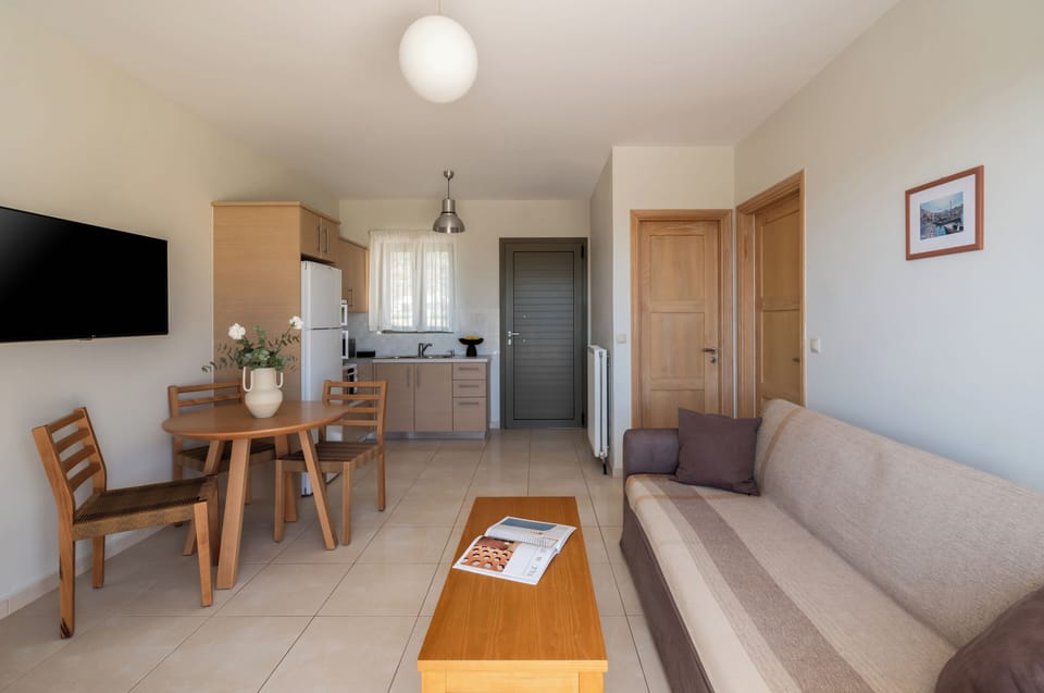 Superior Apartment (2 Adults and 2 Children) | Living area | Smart TV, fireplace