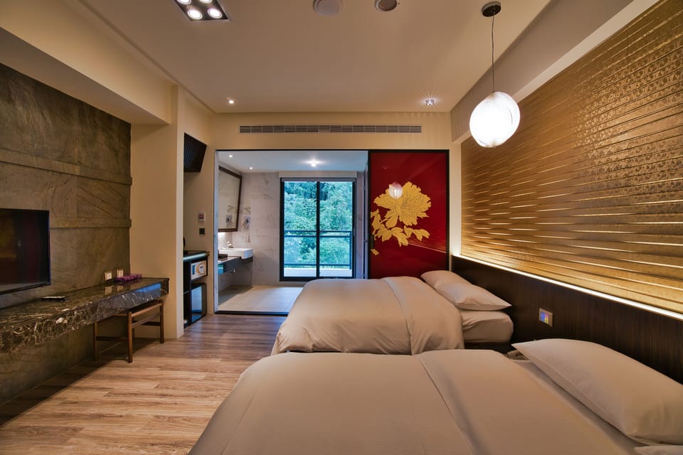 Family Twin Room | Minibar, blackout drapes, free WiFi, bed sheets