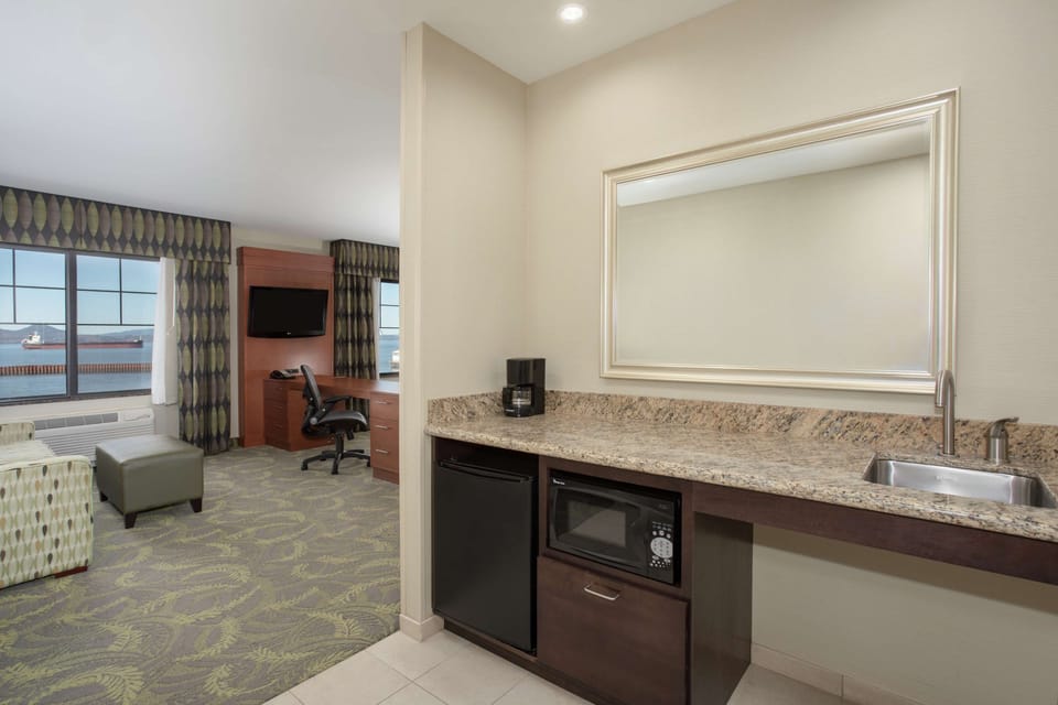 Studio, 1 King Bed, Accessible, Non Smoking | Bathroom | Combined shower/tub, hydromassage showerhead, hair dryer, towels