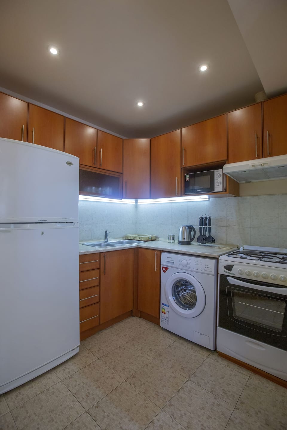Panoramic Apartment, Balcony, Hill View | Private kitchen | Full-size fridge, microwave, stovetop, electric kettle