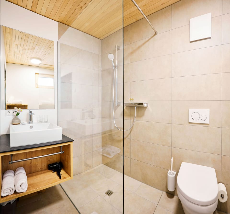 Shower, hair dryer, bathrobes, heated floors