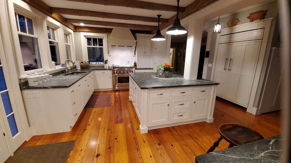 Stove, soapstone island and sub zero fridge.  Ice maker and wine/bev fridges.