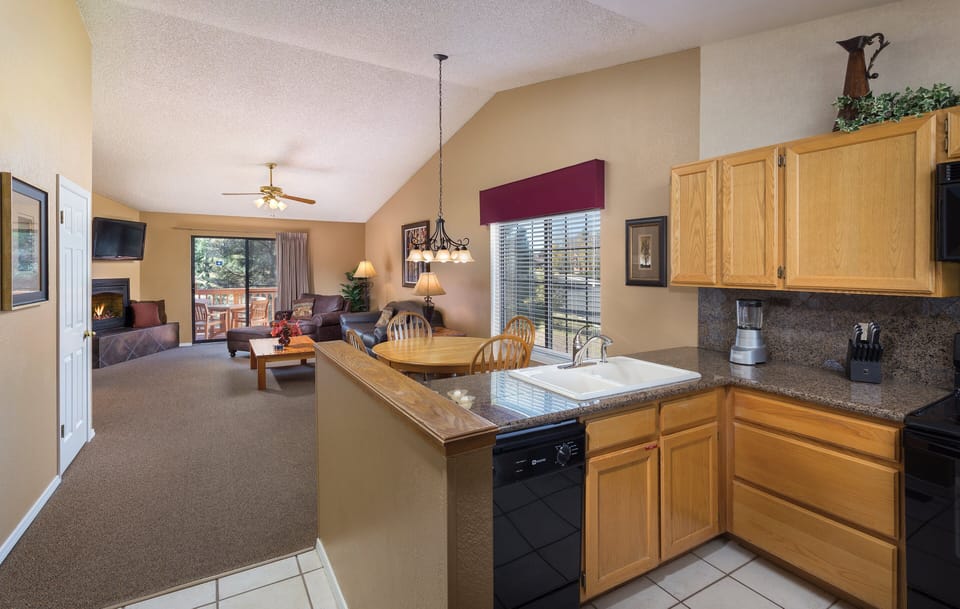 Deluxe Condo, 2 Bedrooms, Kitchen | Private kitchen | Full-size fridge, microwave, stovetop, coffee/tea maker