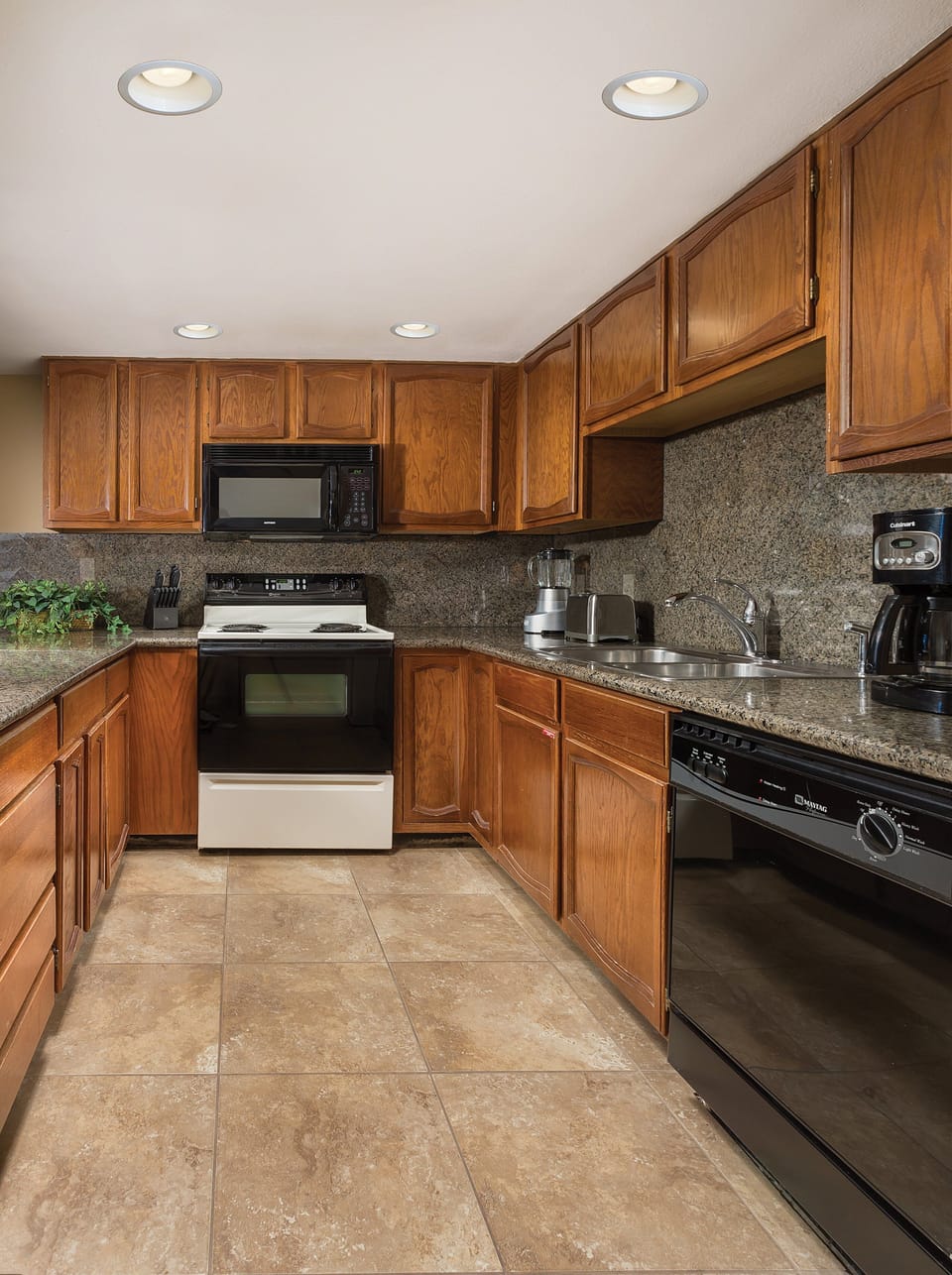 Full-size fridge, microwave, stovetop, coffee/tea maker
