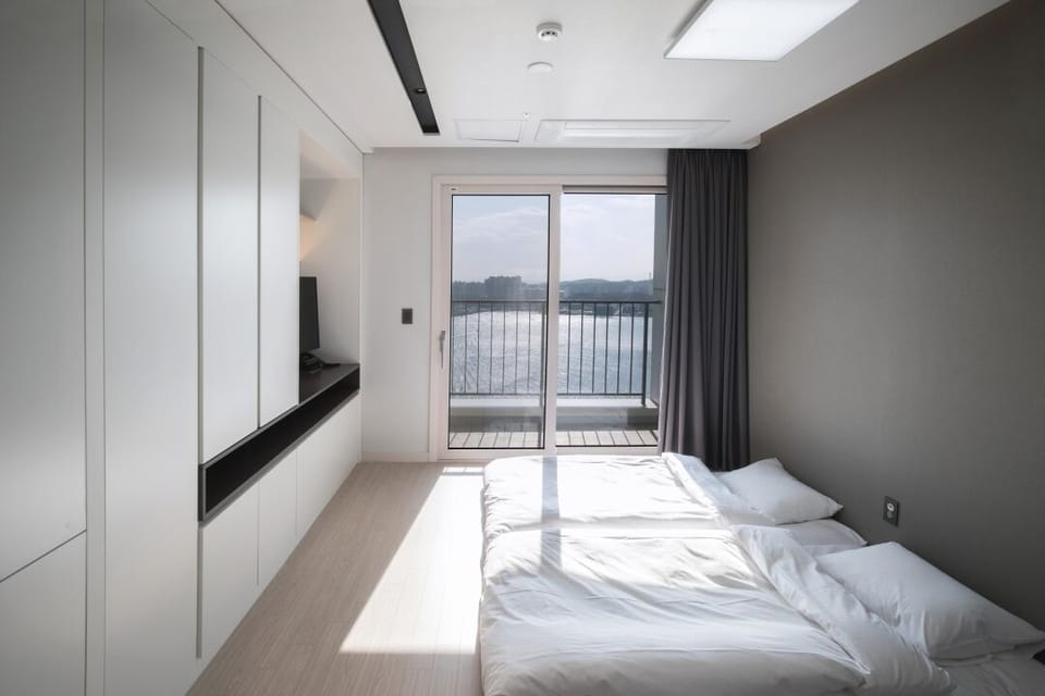 Premium bedding, down comforters, blackout drapes, soundproofing
