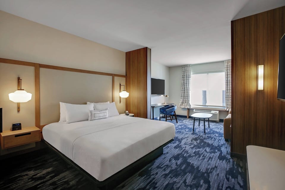 Suite, 1 King Bed with Sofa bed | Desk, laptop workspace, iron/ironing board, free WiFi