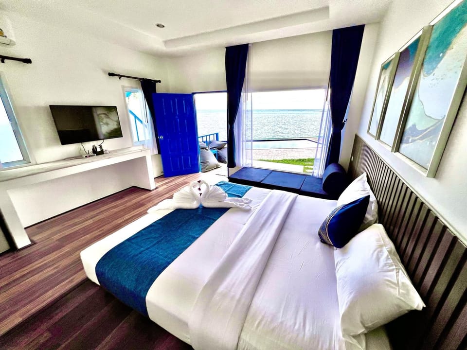 Premier Villa, 1 King Bed, Sea View, Sea Facing | Minibar, WiFi (free), bed sheets