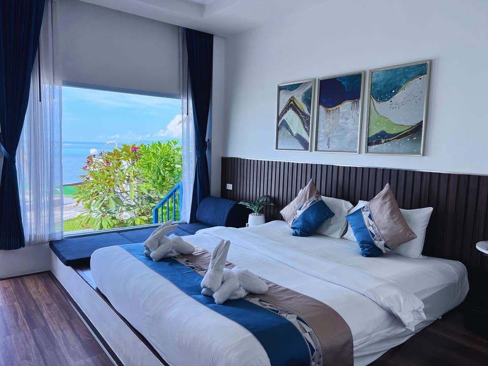 Premier Villa, 1 King Bed, Sea View, Sea Facing | Minibar, WiFi (free), bed sheets