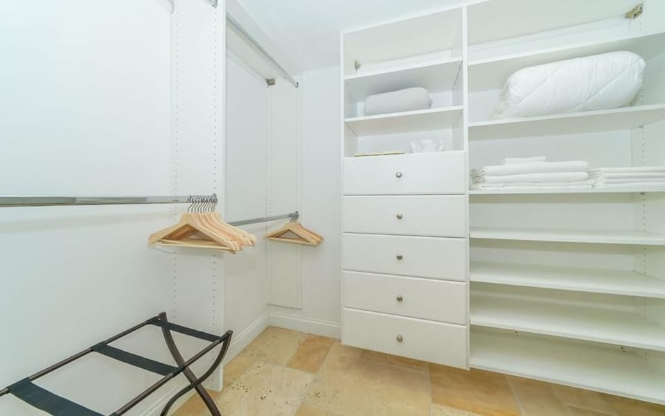 Large walk-in closet in master bedroom