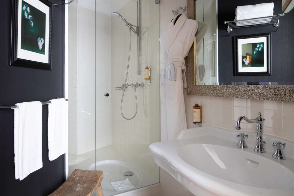 Single Room - Complimentary soft minibar,courtesy tray, Chromecast and digital press | Bathroom | Free toiletries, hair dryer, bathrobes, slippers