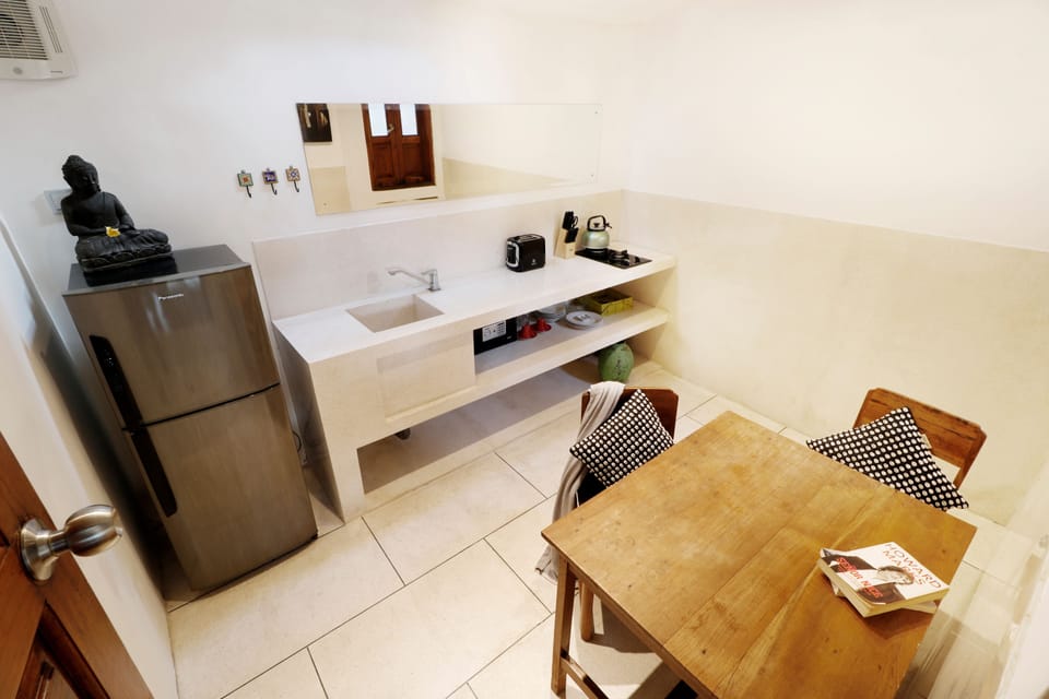One Bedroom Apartment, Shared Pool | Private kitchen | Fridge, coffee/tea maker