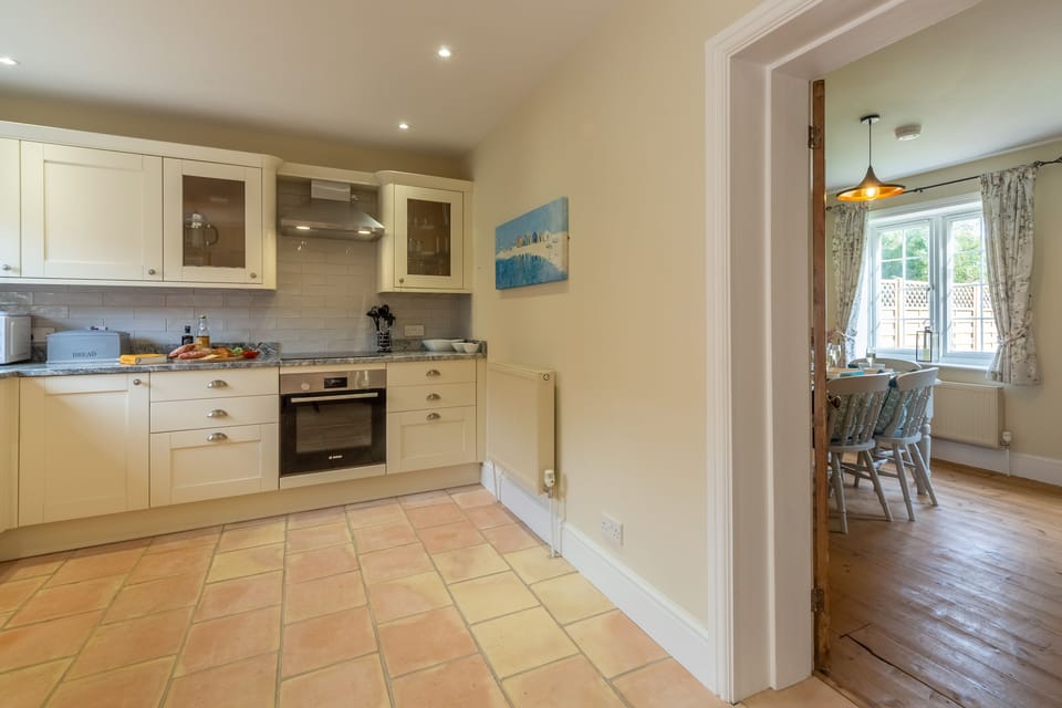 Ground floor: Kitchen, with a view of the dining room