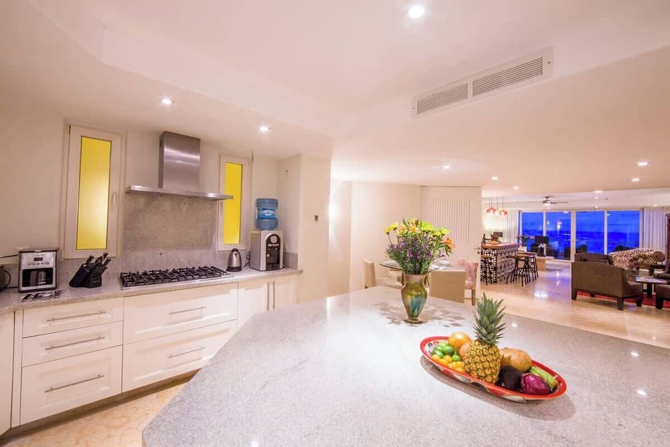 Fully equipped beach house kitchen with modern appliances
