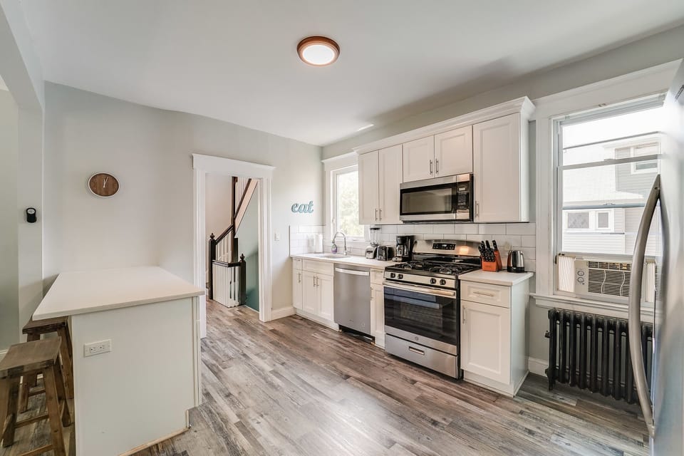 Spacious, renovated kitchen with all amenities and essentials (pots, pans, silverware)