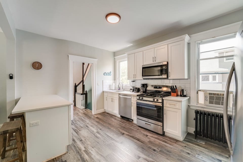 Spacious, renovated kitchen with all amenities and essentials (pots, pans, silverware)