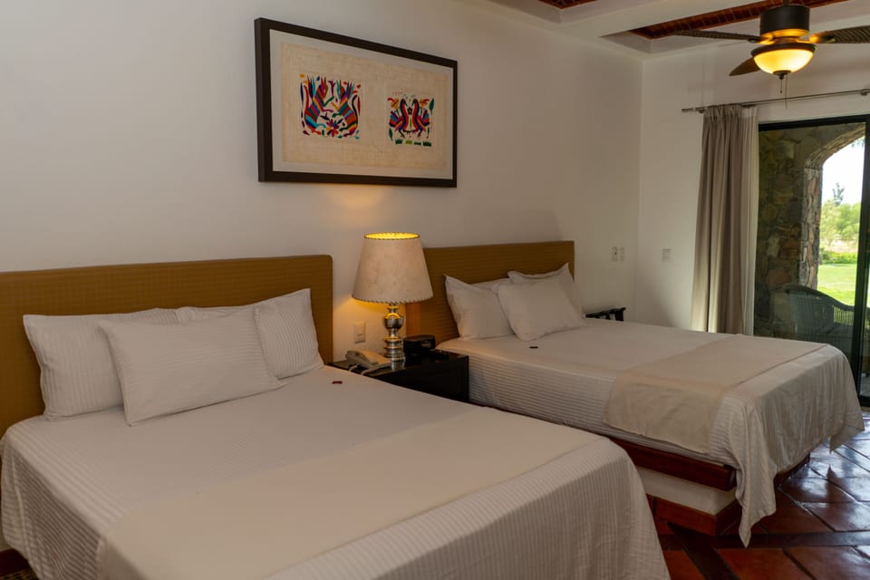 Room, 2 Queen Beds | In-room safe, desk, iron/ironing board (on request), WiFi (free)