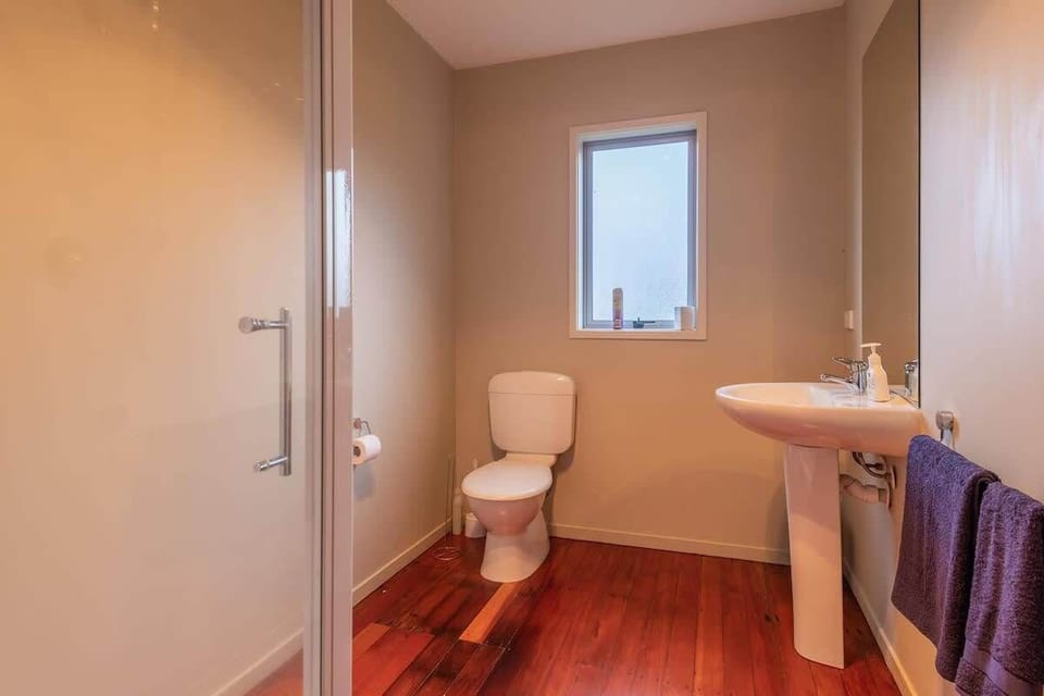 The main bathroom has a shower and toilet.