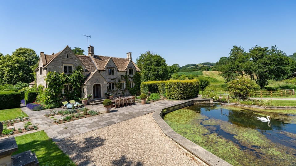 The dining terrace overlooks the lake perfect for al fresco dinners