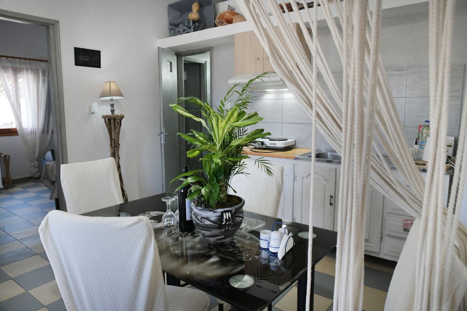 Family Apartment, 2 Bedrooms, Sea View | Private kitchen | Full-size fridge, coffee/tea maker, electric kettle