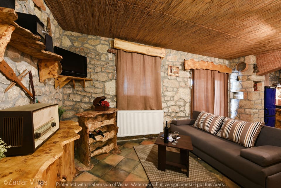 Villa, 4 Bedrooms, Private Pool, Pool View | Living room | TV, fireplace