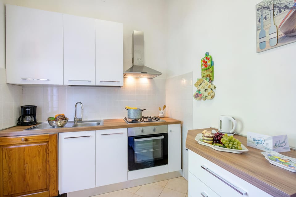 Family Apartment, 3 Bedrooms, 2 Bathrooms, Sea Facing (La Fresia - Focette 100m from sea) | Private kitchen | Full-size fridge, oven, stovetop, dishwasher