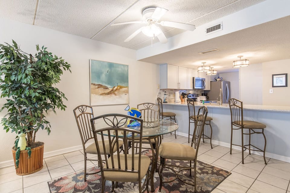 Dining Table sits 4 with additional bar counter seats to enjoy family dinners