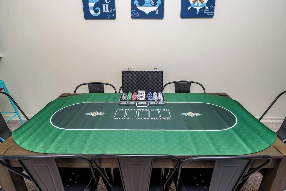 Enjoy Texas Holdem, the items in the pictures can be found in the second-floor closet for you to enjoy. There's a full poker set and other board games!