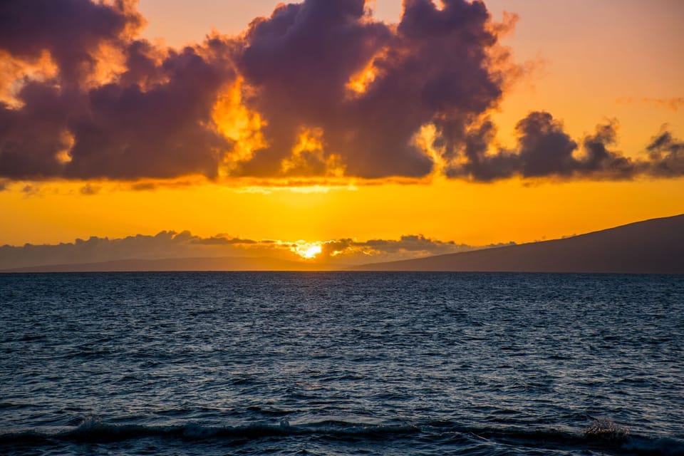 Enjoy stunning sunsets from the shoreline or your private lanai
