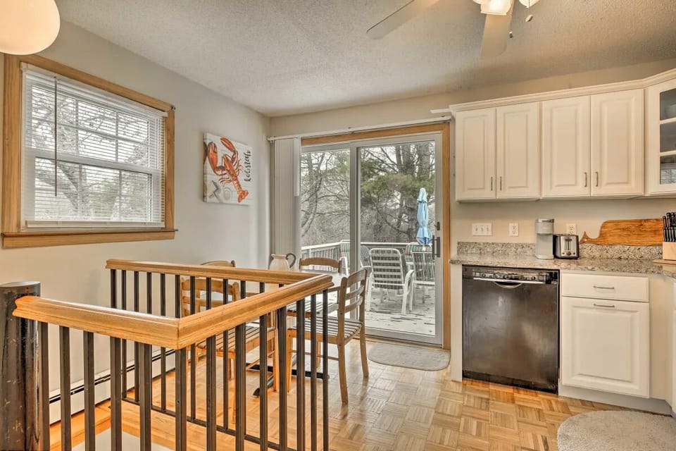 Kitchen with spiral stairs to finished basedment
