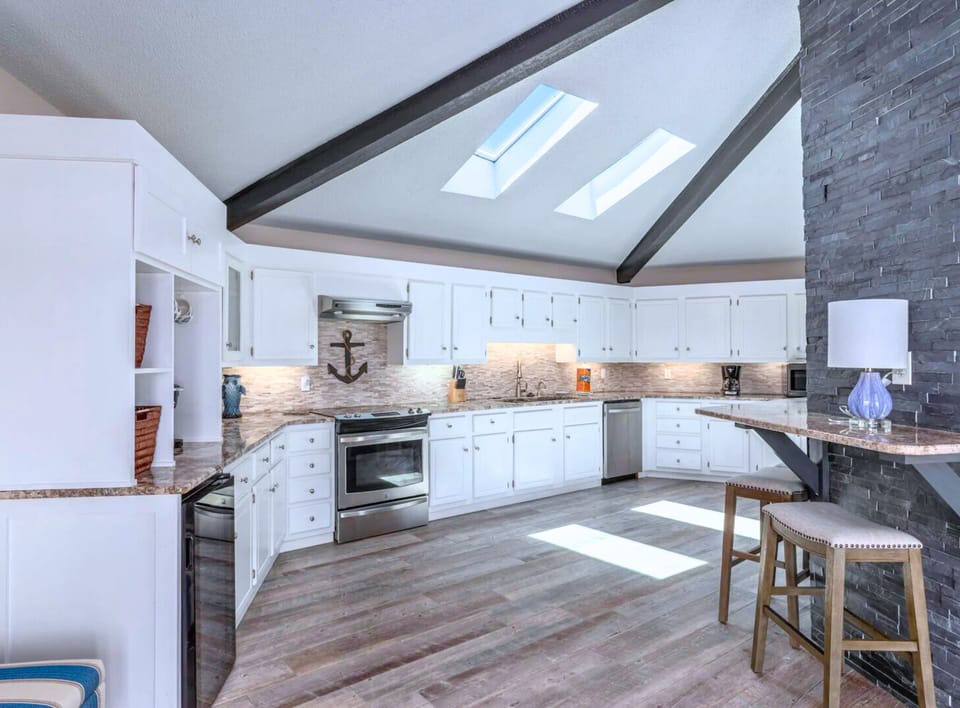 2nd Floor - Open-Concept Living Area: Spacious kitchen, dining area, and comfortable seating for gatherings.