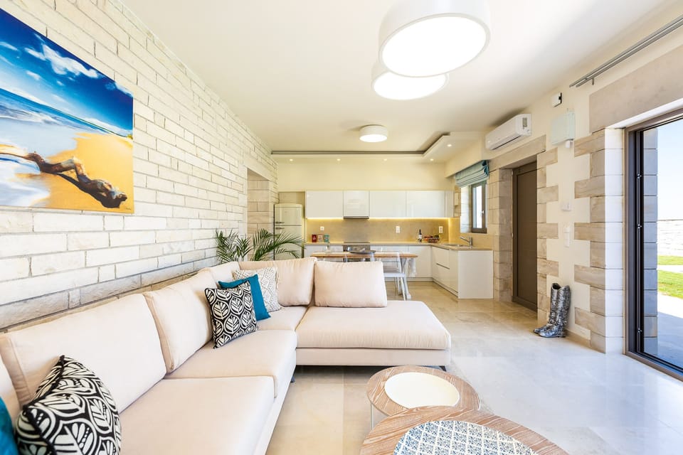 Beautifully decorated living room area! Direct access to the pool terrace!