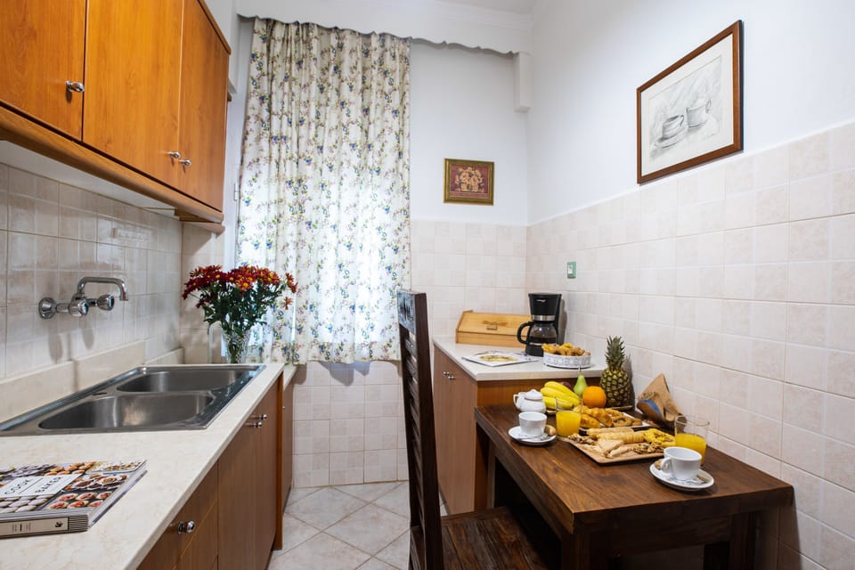 Family Apartment, 2 Bedrooms | Private kitchen | Full-size fridge, oven, stovetop, coffee/tea maker