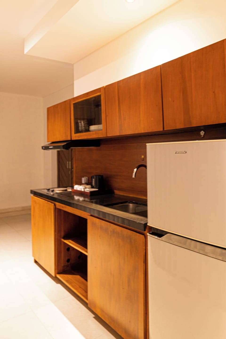 Family Suite, 2 Bedrooms | Private kitchenette | Mini-fridge, electric kettle, highchair, eco-friendly cleaning products