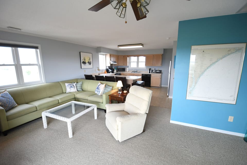 Open reverse floor plan maximizing views of the sound and ocean.