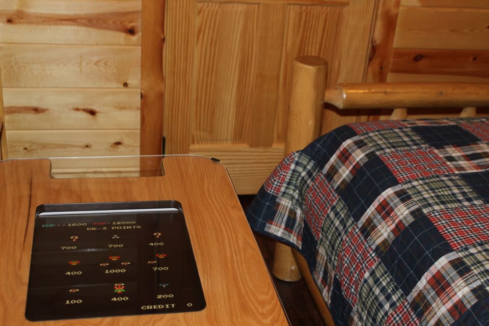Game table in guest bedroom. Over 50 video games to choose from including PacMan