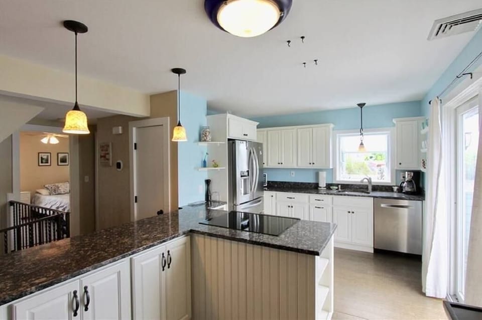 Update kitchen with bar area for extra seating. 