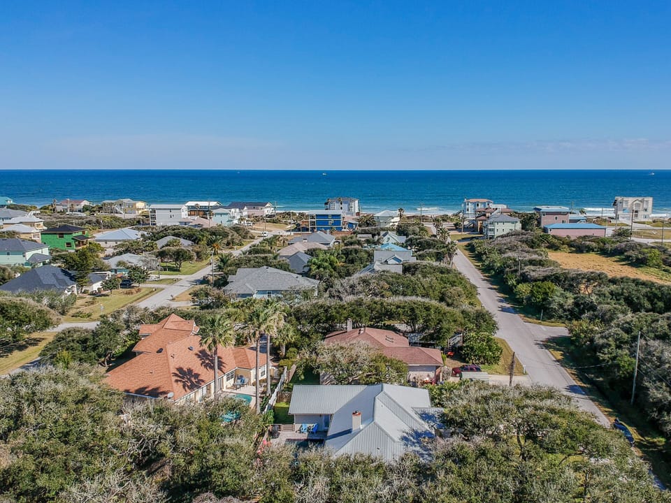 2 min walk to your beach paradise!  Fully stocked garage for your beach needs