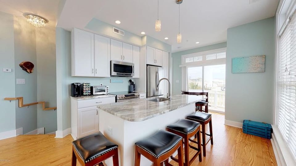 Kitchen area with leather stools