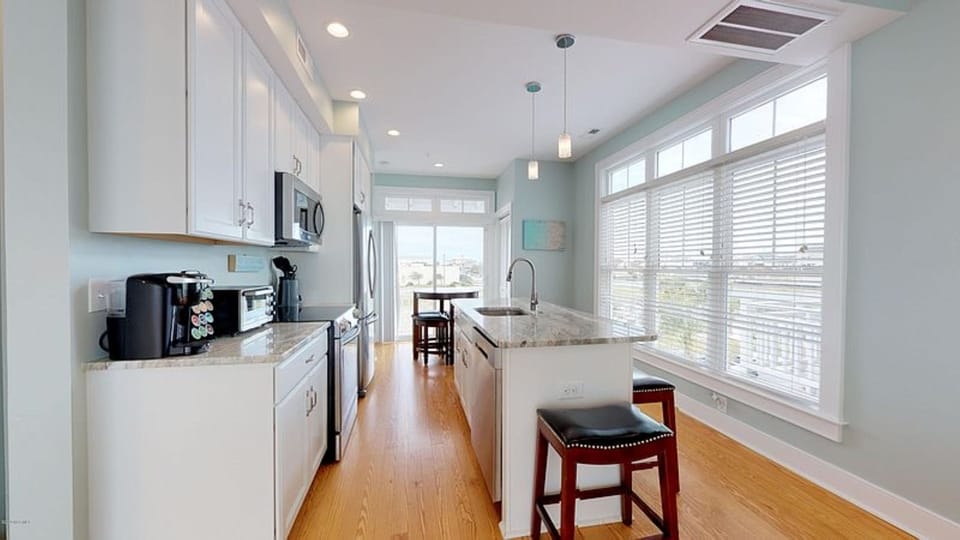 Kitchen area with leather stools