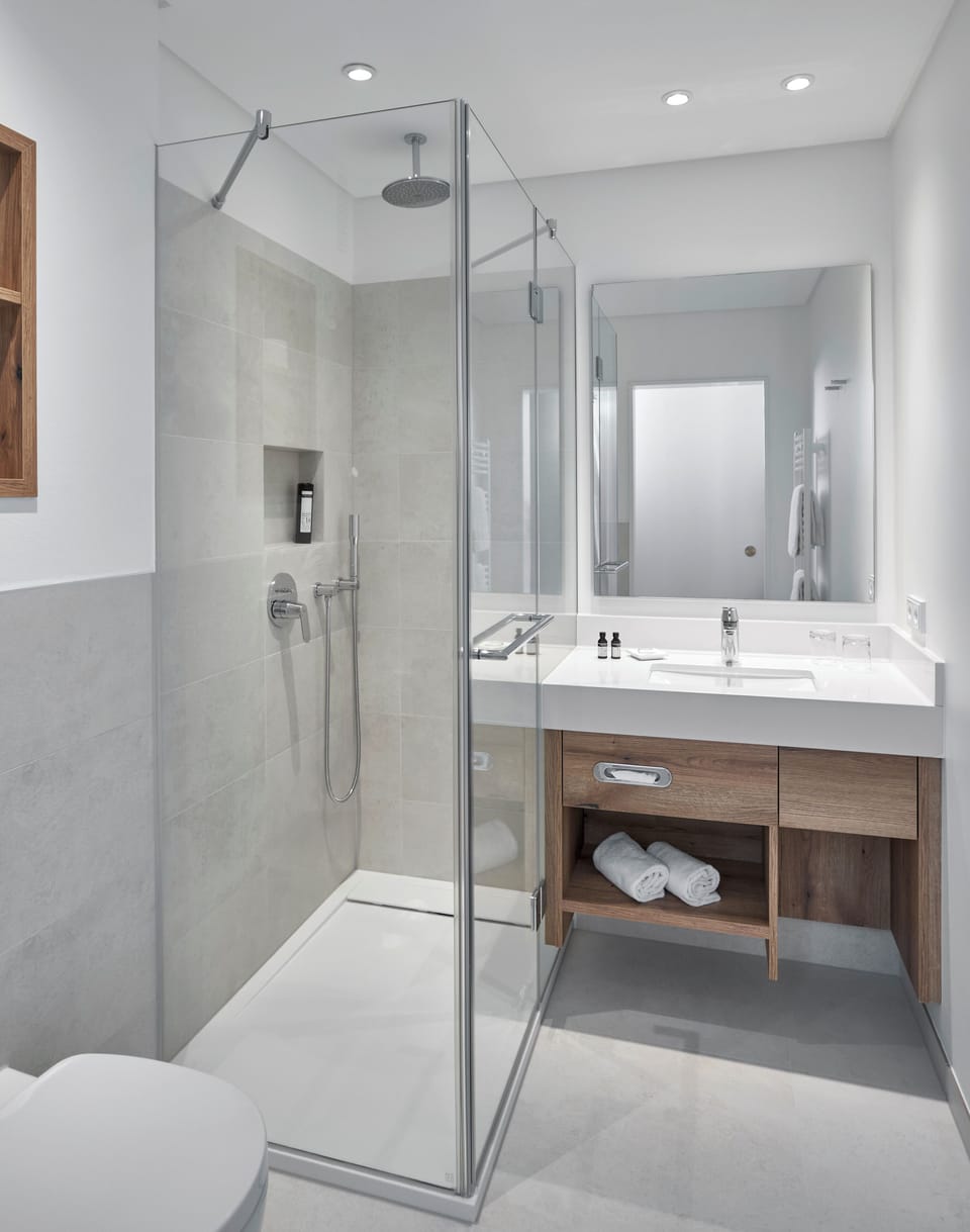 Hair dryer, towels, soap, shampoo